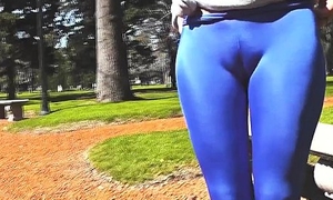 Round Irritant Teen In Ultra Tight Shiny Spandex Like one another Cameltoe In Public!