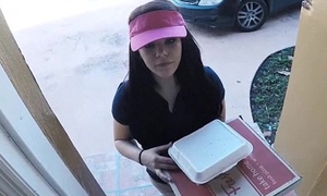 Kimber Woods delivers pizza together with bangs customer for more tips